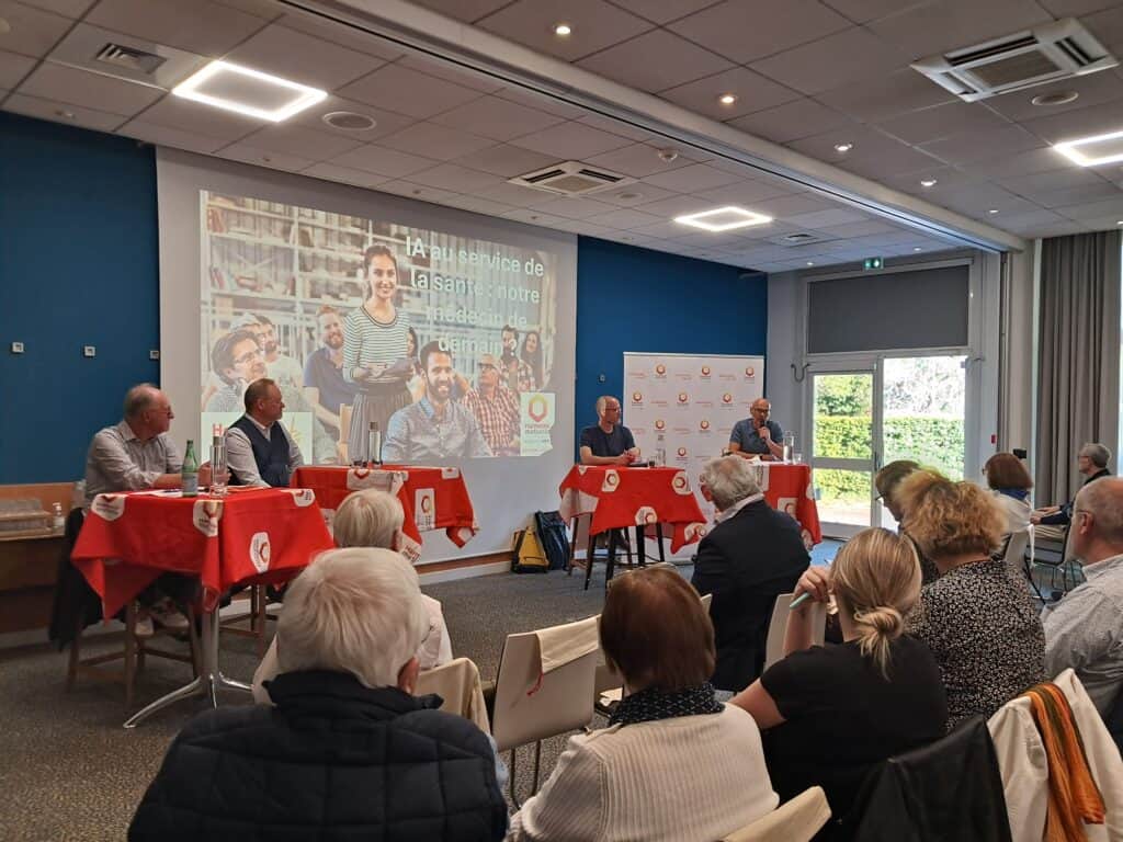 Conférence Access CVL avec intervenants et participants lors d'un événement communautaire.